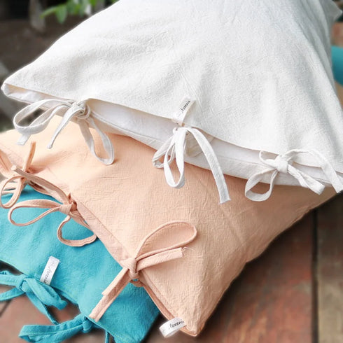 Long cushions with removable covers made of robust cotton house canvas